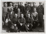 Group portrait of prisoners in the Beaune-la-Rolande internment camp.