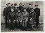 Group portrait of Jewish prisoners in the Beaune-la-Rolande internment camp.