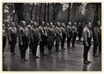 Nazi leaders gather in formation.

Among those pictured are Adolf Hitler and Hermann Goering.