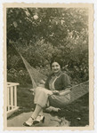 Gretel Kleeblatt poses on a hammock.