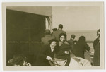 Gretel Kleeblatt (right) and another female passenger pose on the deck of the SS Manhattan while fleeing Germany for the United States.
