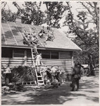 Members of a Jewish labor battalion construct the roof to a building in Hajduhadhaz.