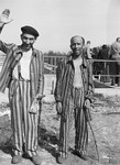 Two survivors of Buchenwald pose for a photograph.