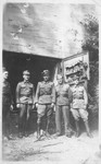 Shmuel (Samuel) (pictured center) and other Polish soldiers pose in front of the Wolf's Lair (Wolfsschanze), Hitler's wartime bunker in northern Poland.