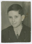 Studio portrait of Stanislaw Rothblum, a Polish Jewish child who was smuggled from Poland into Slovakia and then Hungary together with his mother and then later went to France.