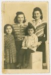Bronia Bruenner poses with her aunt and cousins after liberation.