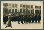 Adolf Hitler walks past his honor guard at a large gathering in the Lustgarten in Berlin.