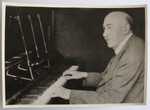 Rudolf Markovitz, an Austrian Jewish refugee and grandfather of the donor, plays the piano in an English pub.