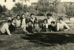 Nadia Cohen poses with a group of children who came on Aliyah.