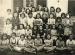 Class photo of young girls a school in Saint Eugene, Algeria.