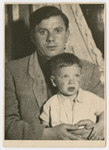Close-up portrait of Nachman Katz and his son sent to his cousins, the Newmans, in America.