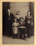 Studio portrait of the Rosenbaum family.

Pictured from left to right; in the back row are Bernard Baruch Rosenbaum, Bernice Bryna Rosenbaum (later Goldberg), and Rosa Rosenbaum (later Lopata).