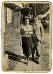 Mendel Feldman down the street with his girlfriend, Frieda Altman (later Feldman).