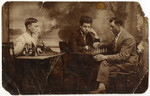 Original Caption: "Three friends: Mendel Grynberg (left), Fishel Feldman, donors' uncle and Chaim Wierzba posing playing chess in Sokolow podlaski, c.