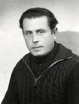 Close-up portrait of Rabbi VictorTulman in the Gurs internment camp wearing a sweater knitted by his girfriend Hella Bacmeister.