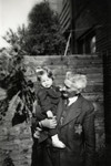 Betty Rosenbaum poses in the arms of her grandfather, Izaak Rosenbaum.