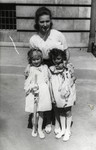 Regina Navrodska poses withJanina Nebel, a Jewish child her family hid, and another little girl.