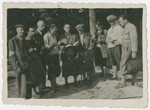 Jewish men in the  Karpaten Oel labor camp near Boryslaw pray outside.