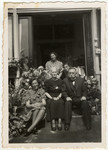 The van Dam family poses outside their home in Enschede.