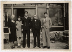 Members of the van Dam family poses for a group portrait after the war.