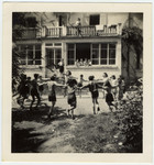Jewish teenagers dance a hora outside the children's home in Versoix, Switzerland.