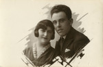 Studio portrait of Chava and Motel Nadel. 

They and their daughters Bluma and Chaya all perished in the Holocaust.
