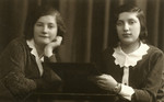 Studio portrait of Yiddish gymnasia students Rachel Godrov and her friend Lea.