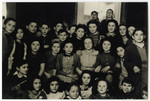 Group portrait of Jewish children celebrating Hannukah in the Institute Ascher in Bex-les-Bains.