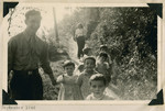 A member of the Frankfurt GI Council takes young children for a walk in Lindenfels.