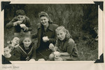 Children [probably from the Lindenfels schoool] enjoy an ice cream picnic.