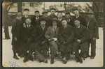 Asher Fetherhar (later Zidon) poses with members of the Hechalutz Mizrachi hachshara in either Warsaw or Warta.