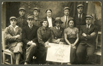 Asher Fetherhar (later Zidon) poses with members of the Hechalutz Mizrachi hachshara in Nasielsk.