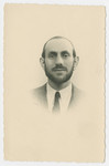 Studio portrait of Izak Stiel, probably taken for identification prior to his immigration to Canada.
