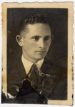Studio portrait of Yaakov Luksenburg, a young man in Zwolen Poland, who later perished in Skarzysko Kamienna.