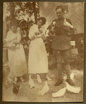 Photograph of Walter Lande and his sisters, Lilli and Margarete, holding pigeons.