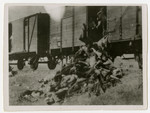 Corpses are tossed from the train during a stop in Podu Iloaiei.