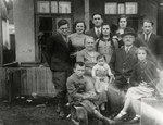 Prewar photograph Herskowicz family in front of their home.