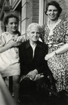 Close-up portrait of three generations of Jewish women in The Netherlands.