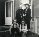 Prewar photograph of the women of the van Collem family standing outside their apartment.