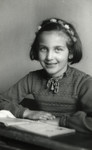 Studio portrait of Anita Randerath, a young Jewish girl and cousin of the donor, who was killed shortly after this photo was taken.