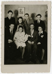 Group portrait taken at the wedding of Leon and Sally Korn in the Foehrenwald displaced person's camp.