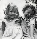 Close up portrait of two young girls in the Foublaines children's home.