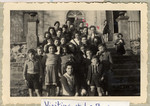 Group portrait of Jewish DP youth outside the Chateau La Borie children's home in Limoges.