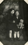 Studio portrait of Gerda and Sonja Beruh in Vienna, Austria at 7 and 6 years old respectively.