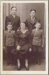 Studio portrait of the Press family before the war.
