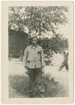 Gershon Press poses after the war in his concentration camp uniform.