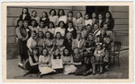 Group portrait of young religious women from Kibbutz Bnot Agudat Yisrael in the Bad Gastein displaced persons' camp.