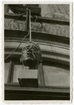 A bust of Adolf Hitler hangs outside of a building in Krofdorf, Germany.