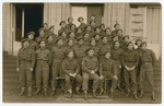 Group portrait of the members of the Third Battalion, Company A of the Jewish Brigade at their headquarters in Antwerp.