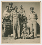 Jewish Brigade soldiers who had previously been interned on the Isle of Mauritius train in Egypt.
